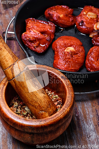 Image of Sun-dried tomatoes in the pan