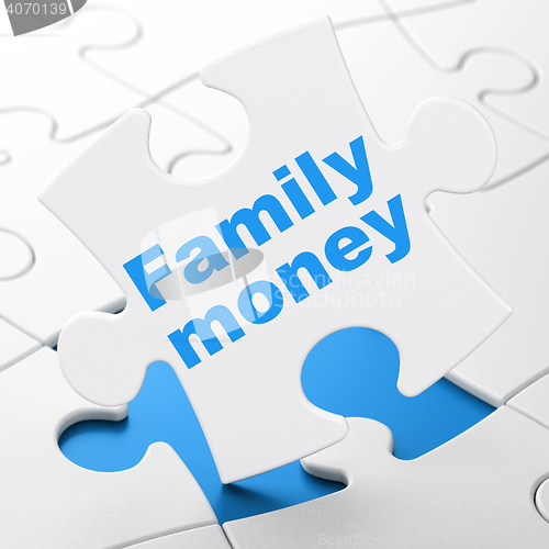Image of Currency concept: Family Money on puzzle background