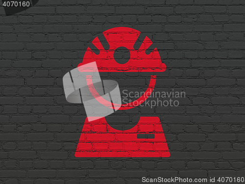 Image of Manufacuring concept: Factory Worker on wall background