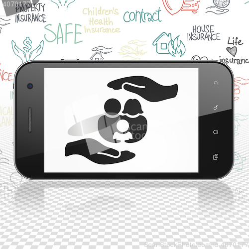 Image of Insurance concept: Smartphone with Family And Palm on display