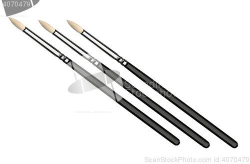 Image of three make up brushes