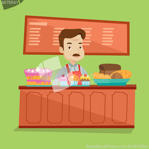 Image of Worker standing behind the counter at the bakery.