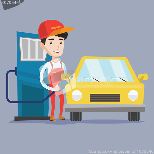 Image of Worker filling up fuel into car.