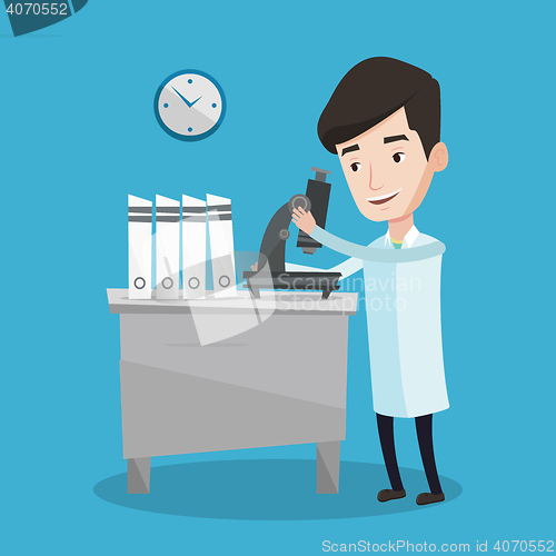Image of Laboratory assistant with microscope.