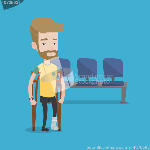 Image of Man with broken leg and crutches.