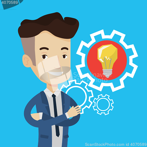 Image of Man with business idea bulb in gear.