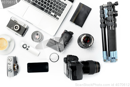 Image of Workplace of business. Modern male accessories and laptop on white