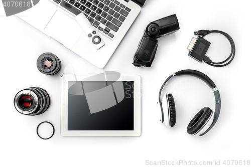 Image of Workplace of business. Modern male accessories and laptop on white