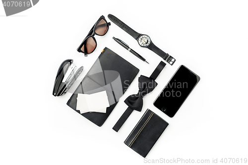 Image of Still life of casual man. Modern male accessories on white