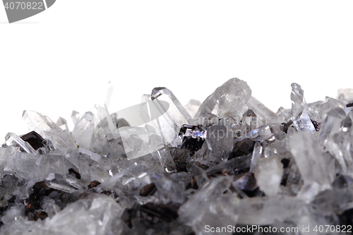 Image of white rock-crystal with galenite background