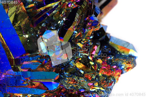 Image of crystal with metal rainbow surface