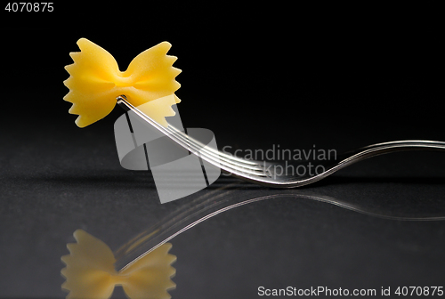 Image of Pasta farfalle on a fork