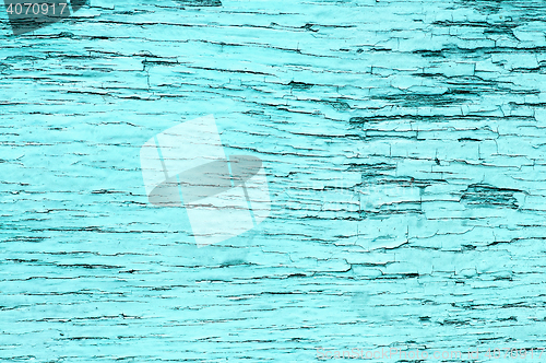 Image of Old wooden board with peeling painted blue