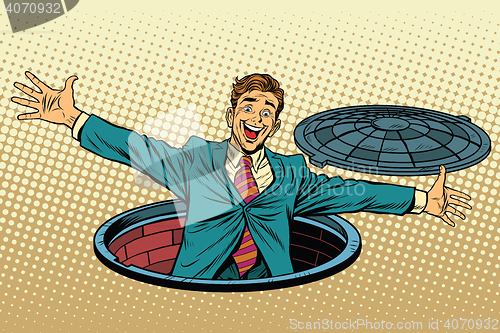 Image of joyful man in the manhole