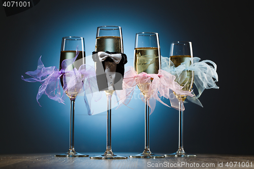 Image of Conceptual decorated champagne glasses for party
