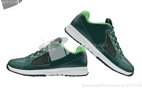 Image of green walking sport shoes isolated