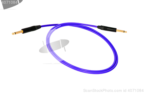 Image of Guitar audio jack with blue cable isolated