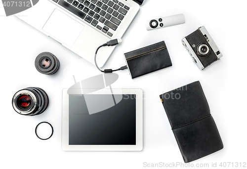 Image of Workplace of business. Modern male accessories and laptop on white