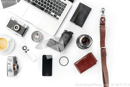 Image of Workplace of business. Modern male accessories and laptop on white