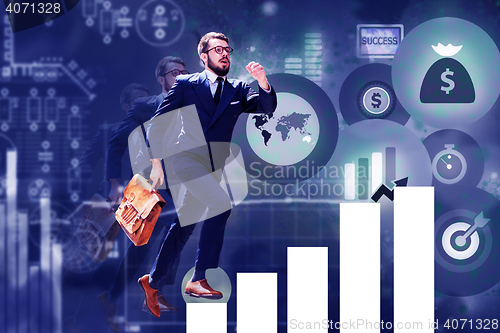 Image of young businessman jumping over steps of chart or graph