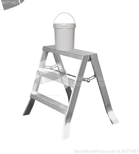 Image of Small metal ladder with paint isolated