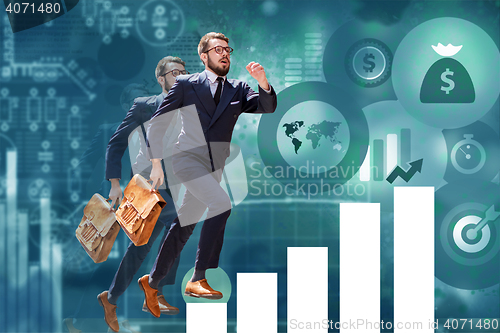 Image of young businessman jumping over steps of chart or graph