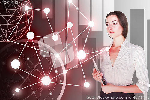 Image of Young business woman with laptop
