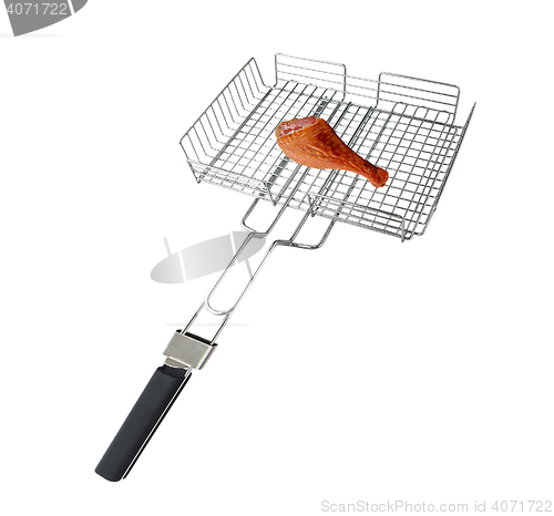 Image of Grilling basket with chicken meet isolated