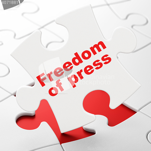 Image of Politics concept: Freedom Of Press on puzzle background