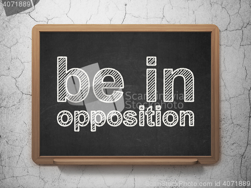 Image of Politics concept: Be in Opposition on chalkboard background