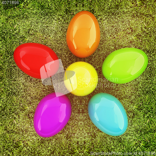 Image of Colored Easter eggs as a flower on a green grass. 3D illustratio