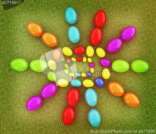 Image of Easter eggs as a \"Happy Easter\" greeting on a green grass. 3D il