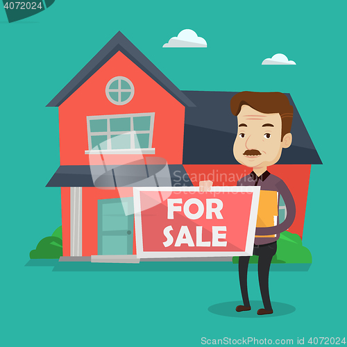 Image of Real estate agent offering house.