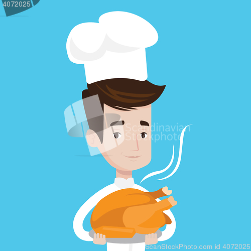 Image of Chief cooker holding roasted chicken.
