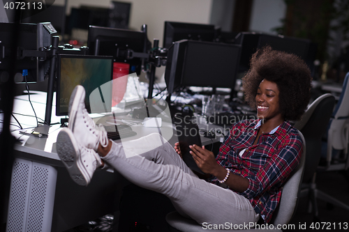 Image of portrait of a young successful African-American woman in modern 
