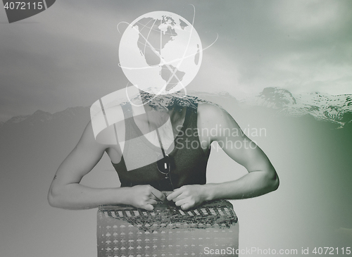 Image of man wtih suitcase ready to travel as tourist on gray background