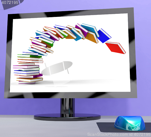 Image of Stack Of Books Falling On Computer Shows Online Learning