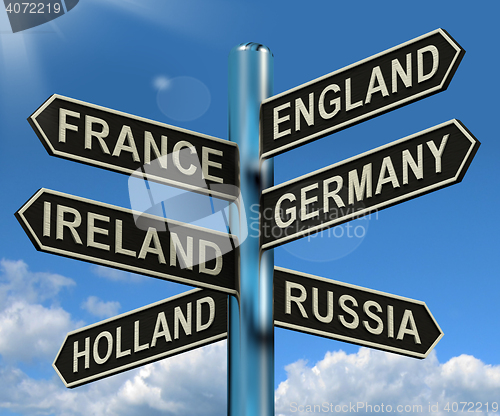 Image of England France Germany Ireland Signpost Showing Europe Travel To