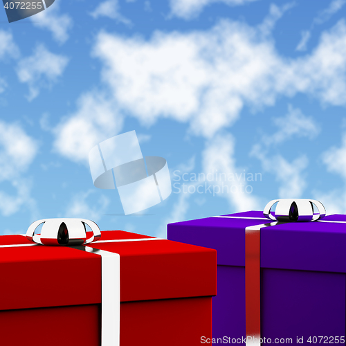 Image of Red And Blue Gift Boxes With Sky Background As Presents For Him 