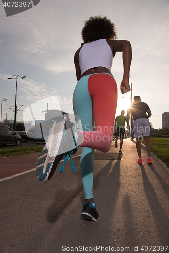 Image of multiethnic group of people on the jogging