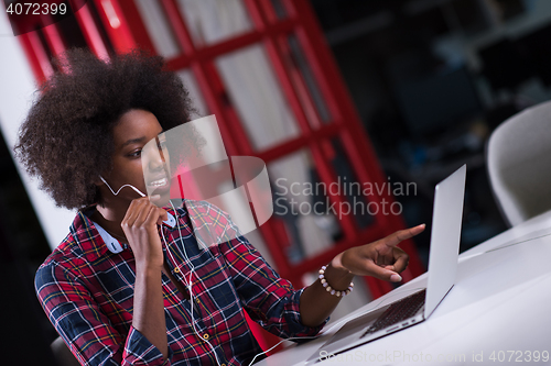 Image of portrait of a young successful African-American woman in modern 