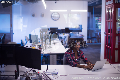 Image of portrait of a young successful African-American woman in modern 