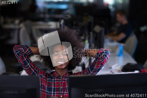 Image of portrait of a young successful African-American woman in modern 