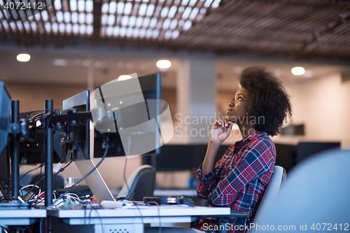 Image of portrait of a young successful African-American woman in modern 