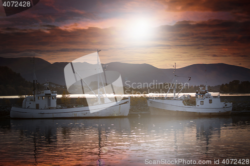 Image of Fishing Boats in Sunset