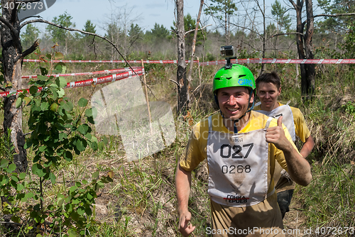 Image of Team runs between stages in extrim race.Tyumen