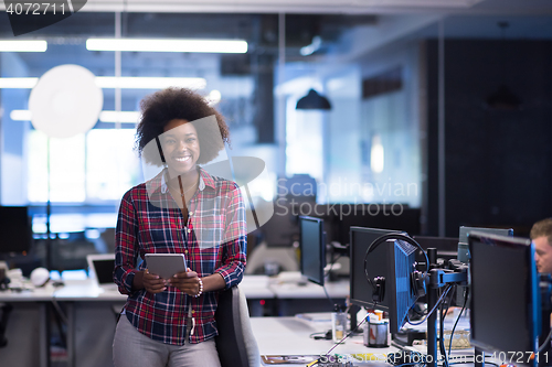 Image of portrait of a young successful African-American woman in modern 