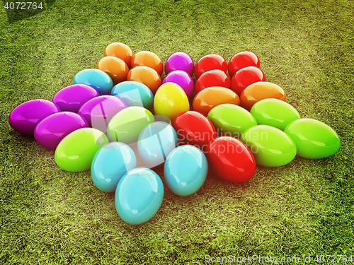 Image of Colored Easter eggs as a flower on a green grass. 3D illustratio