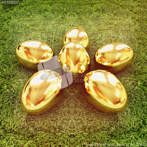 Image of Gold Easter eggs as a flower on a green grass. 3D illustration. 