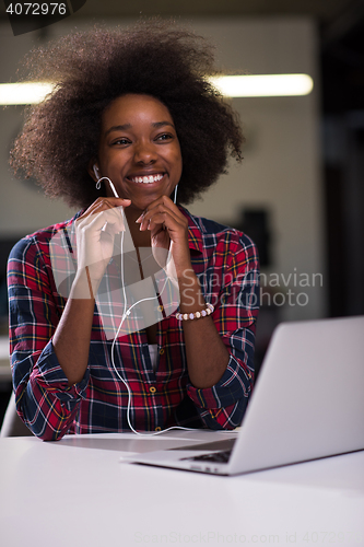 Image of portrait of a young successful African-American woman in modern 